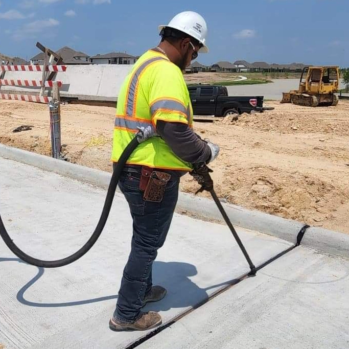 Construction Worker sealing expansion joint